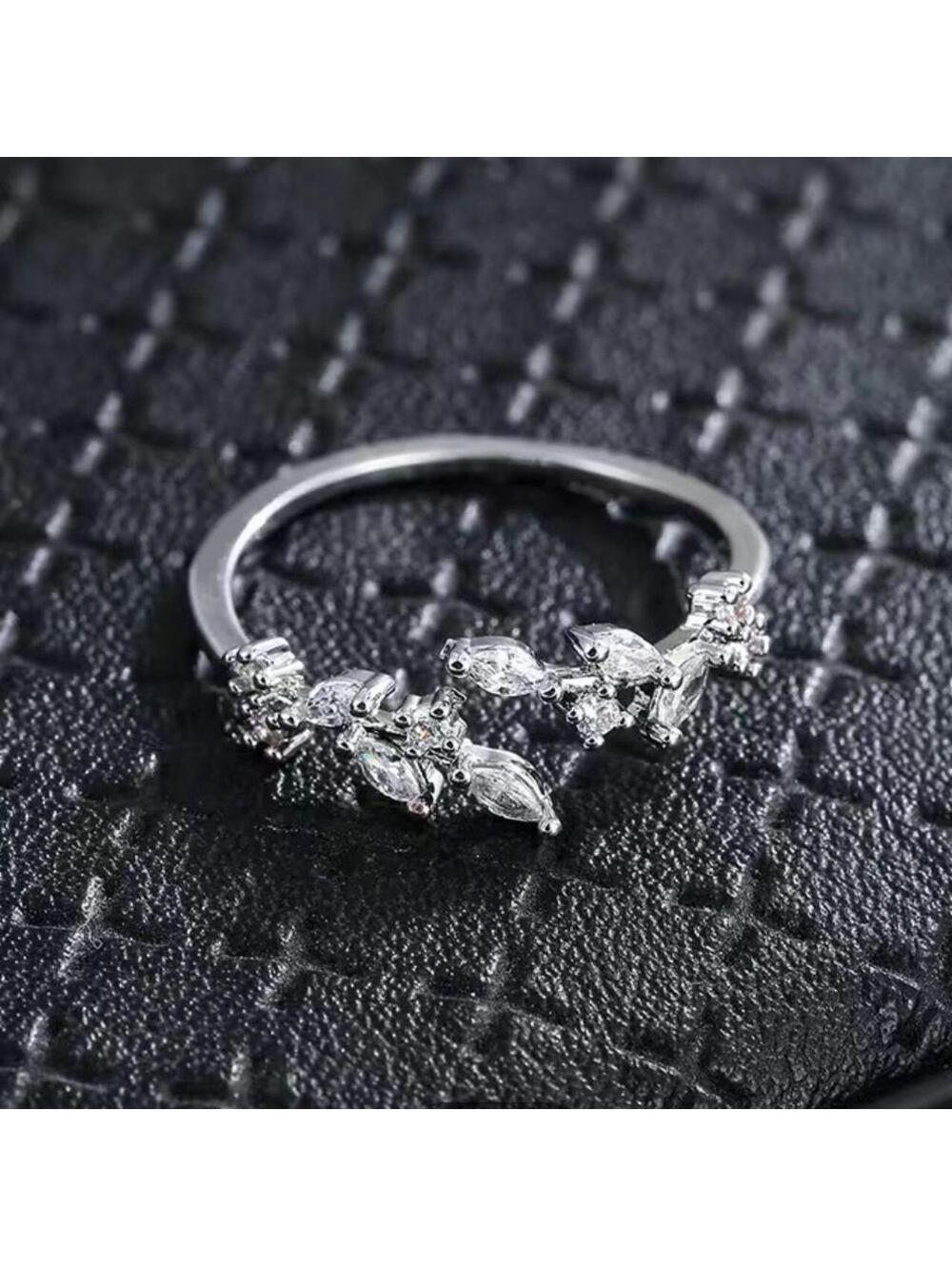 Adjustable one size silver ring
